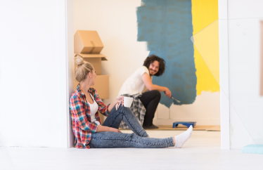 new homeowners taking a break from painting their home